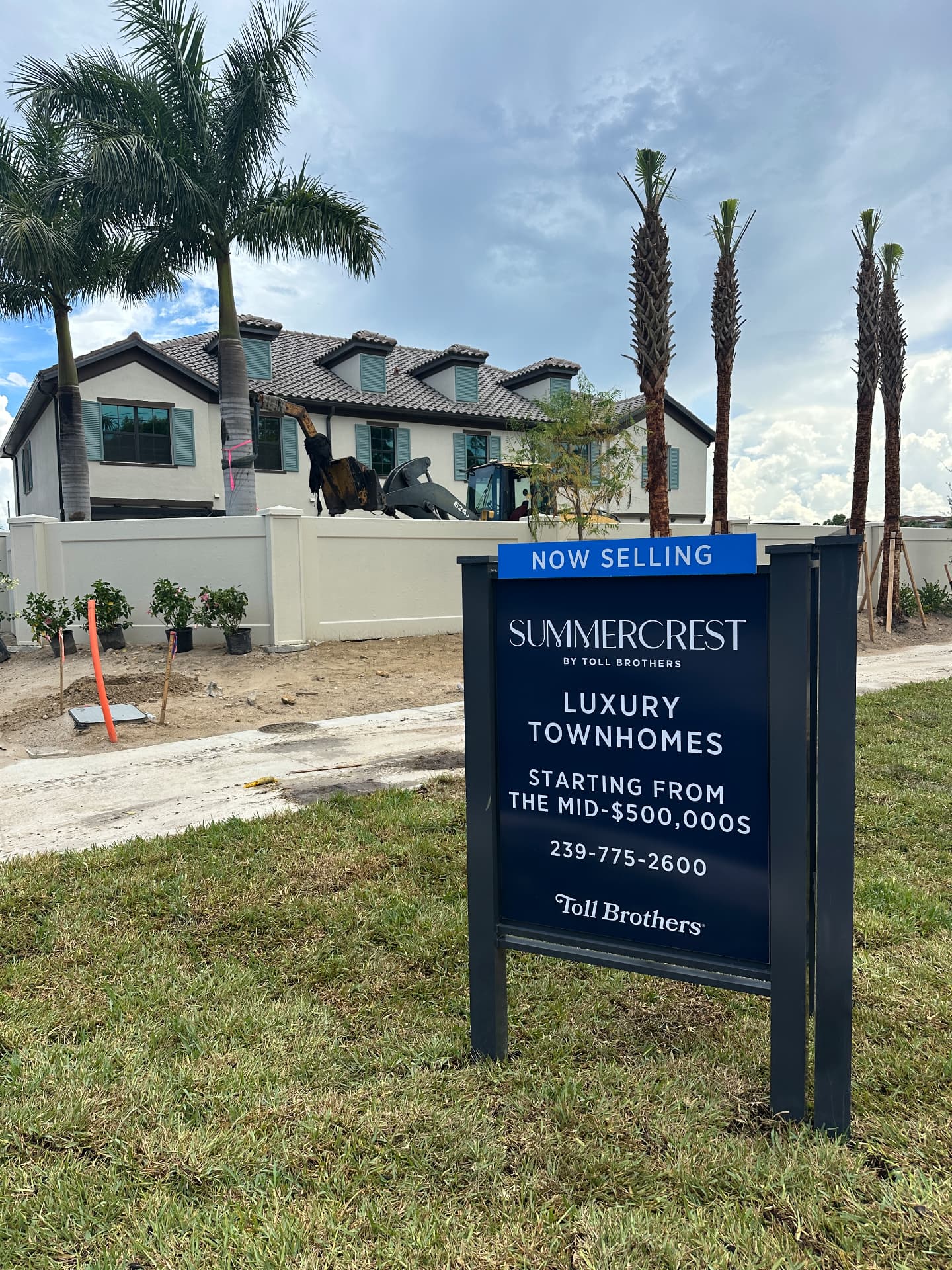 Summercrest by Toll Brothers Now Selling sign in Estero, Florida advertising luxury townhomes starting from the mid $500,000s, photographed September 6, 2026