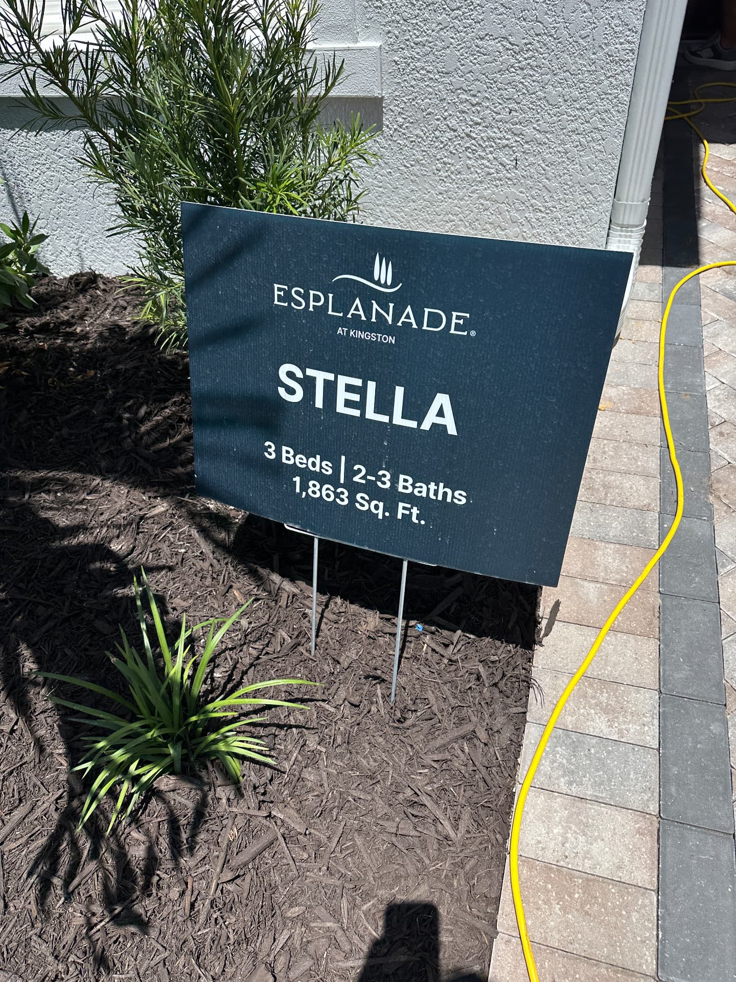 Esplanade at Kingston Stella floor plan model home sign photographed August 2026 by Jack Mancini Team