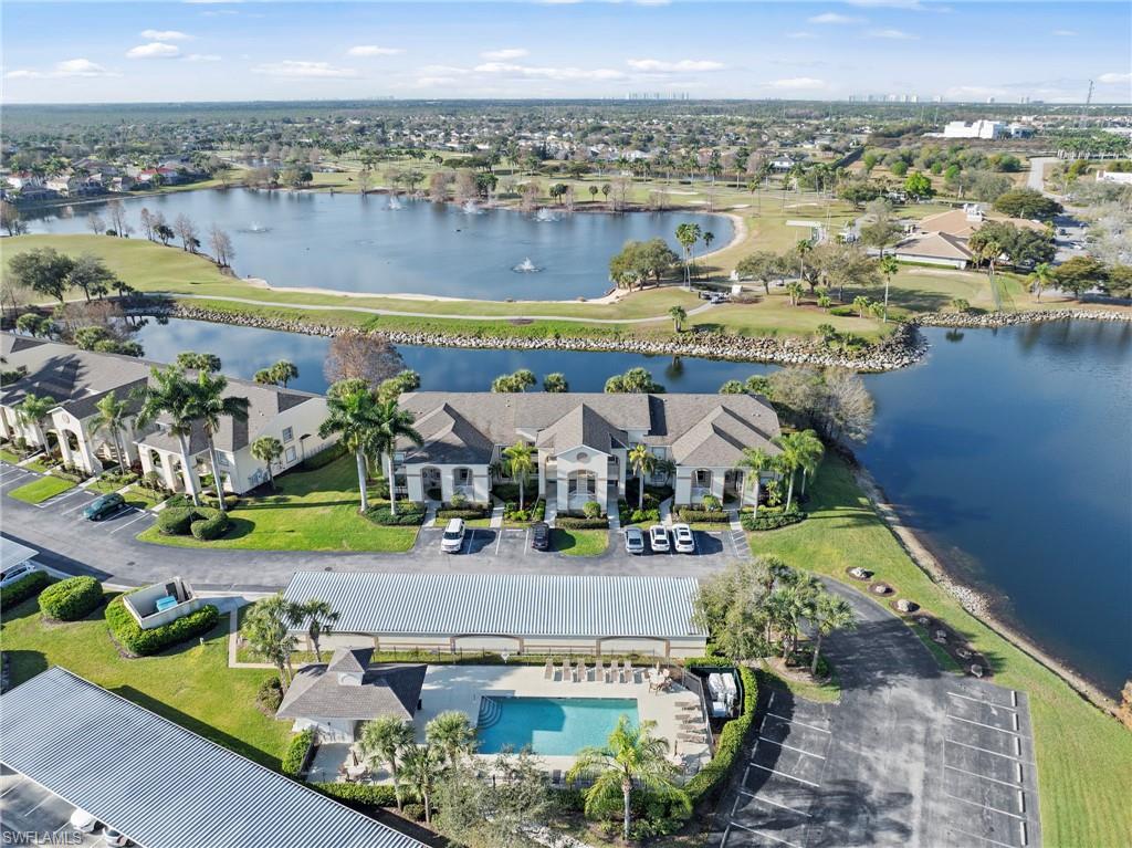 Aerial view of Stoneybrook condos with lake and golf course views