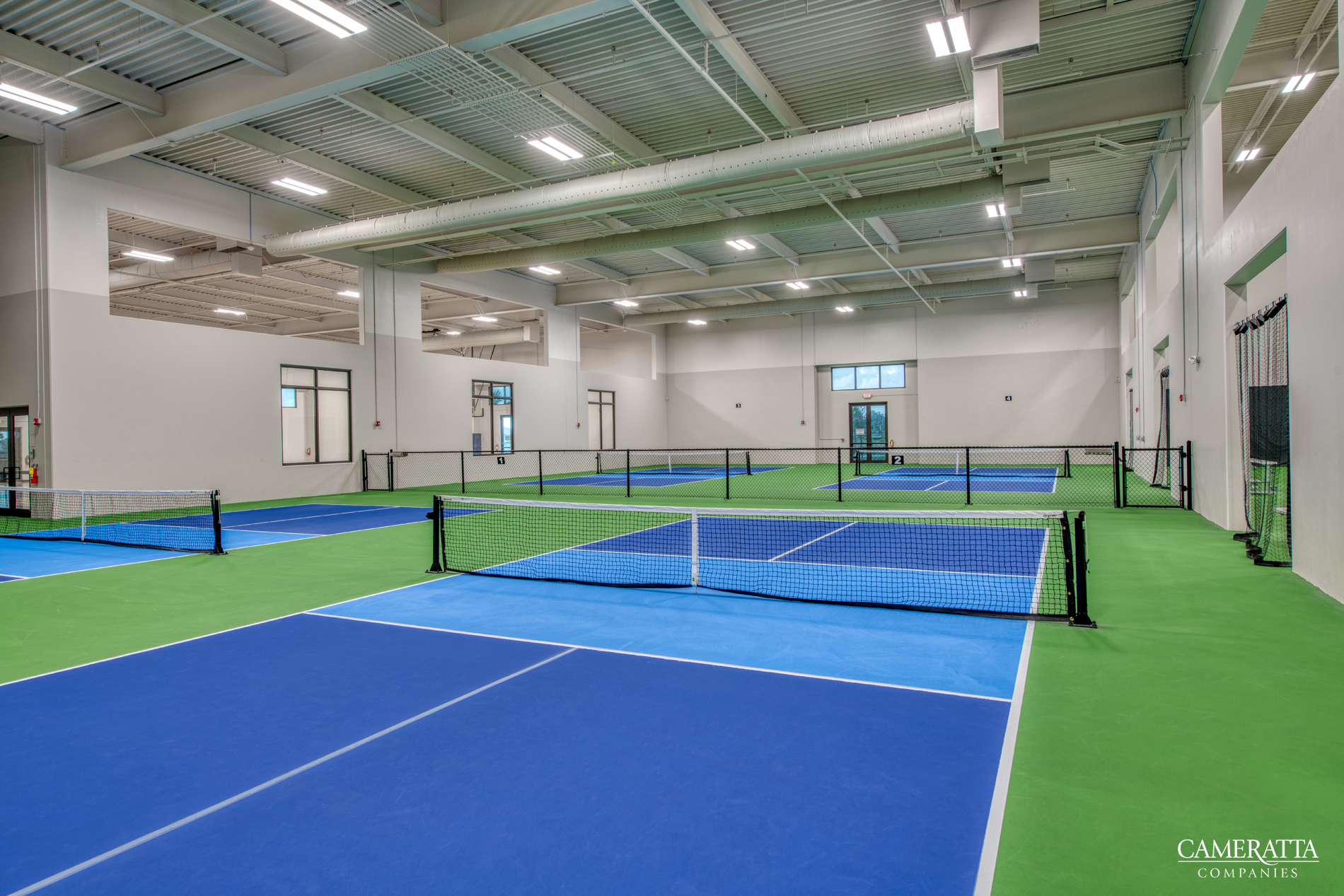 Indoor pickleball courts at Verdana Village